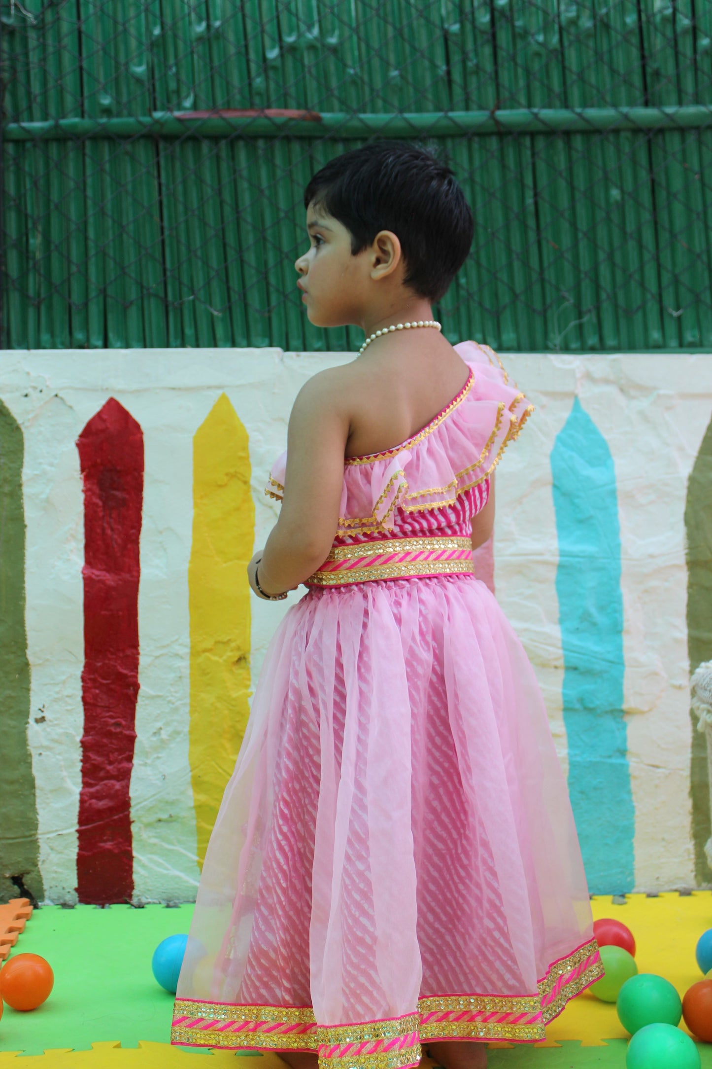 Pink off shoulder leheriya lehenga