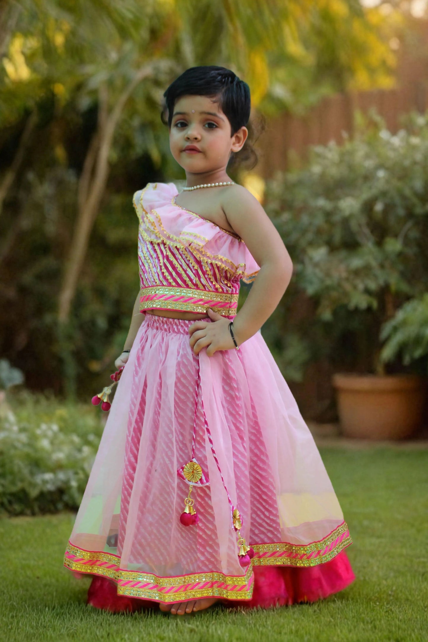 Pink off shoulder leheriya lehenga