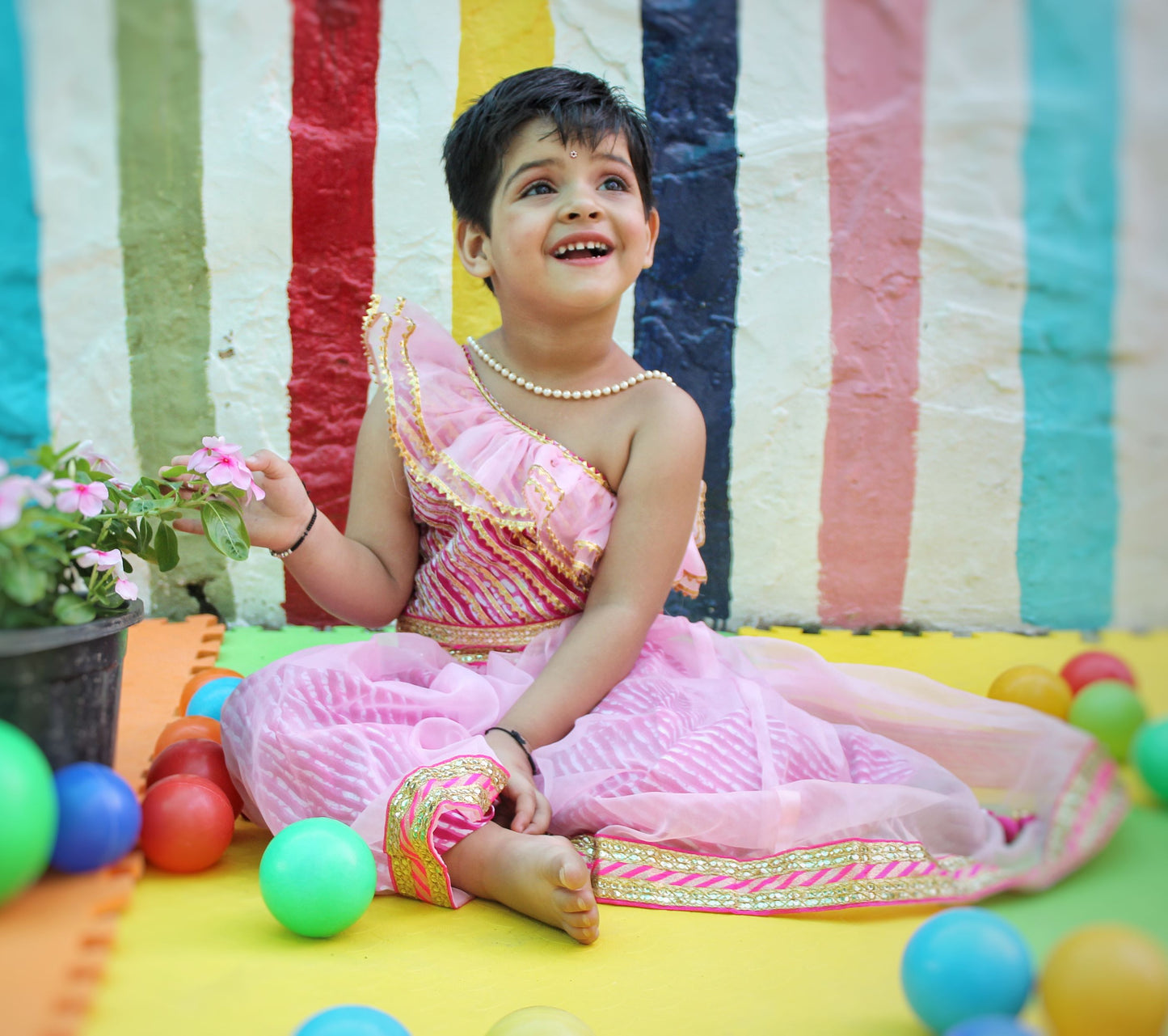 Pink off shoulder leheriya lehenga