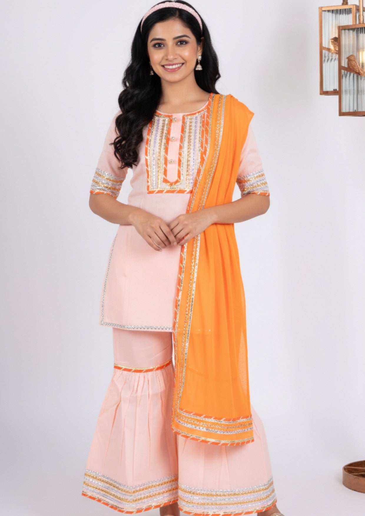 Peach sharara set with orange dupatta for women