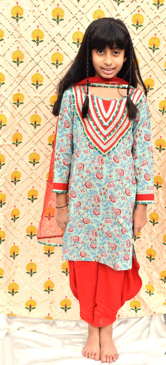 Hara : Green printed kurta with red dhoti and dupatta