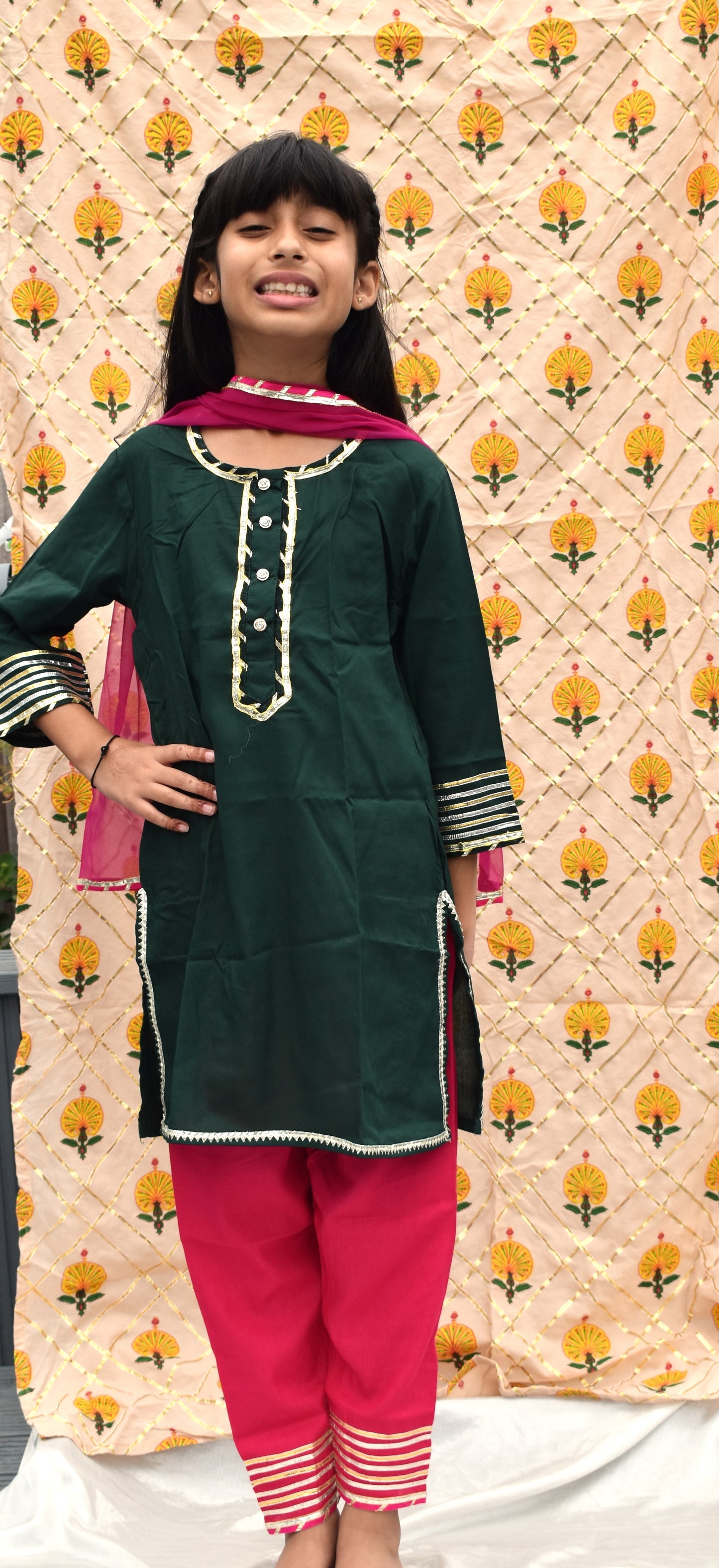 Ira Haree : dark green kurta with pink pants and dupatta for girls