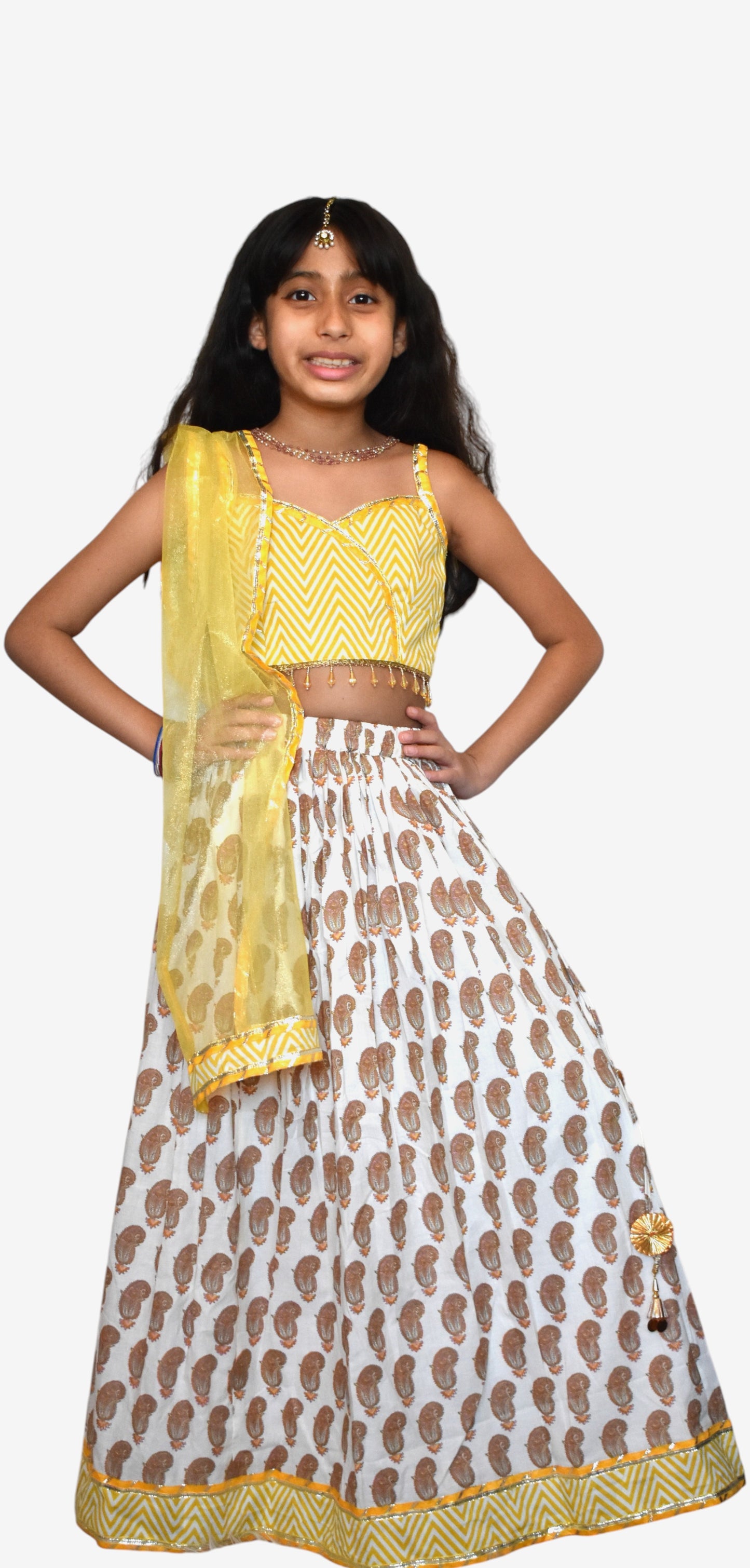 Yellow paisley lehenga with zig zag blouse and net dupatta