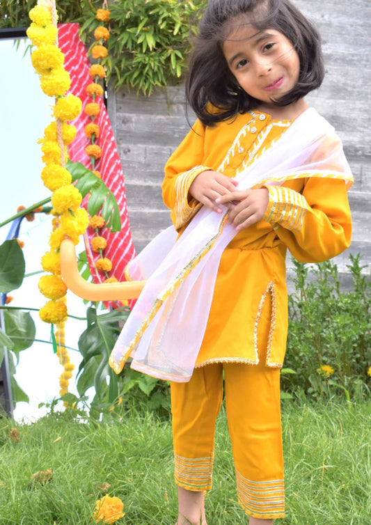 Manjal suit for little girls