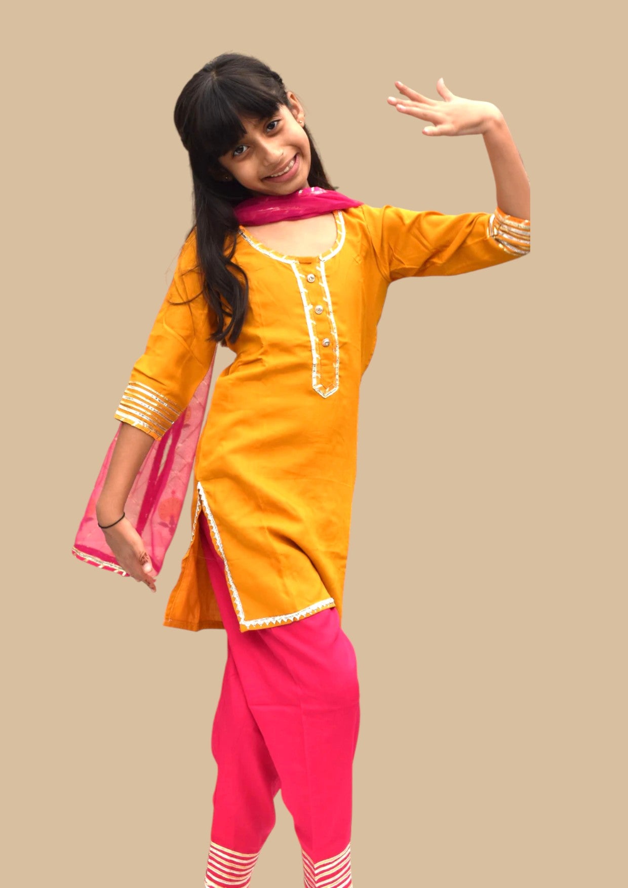 Ira Peel : Yellow kurta with pink pants and dupatta for girls